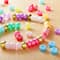 12 Pack: 1lb. Multicolor Pastel Pony Beads by Creatology™, 6mm x 9mm